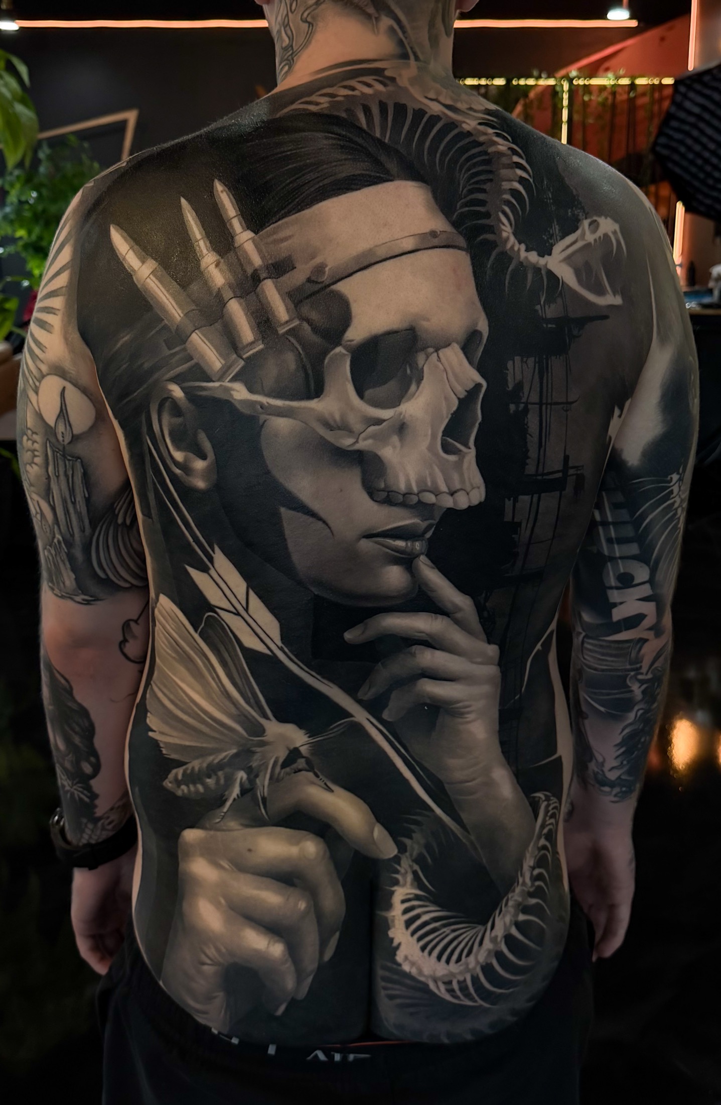 Finished dark realism back tattoo by Fábio Guerreiro.