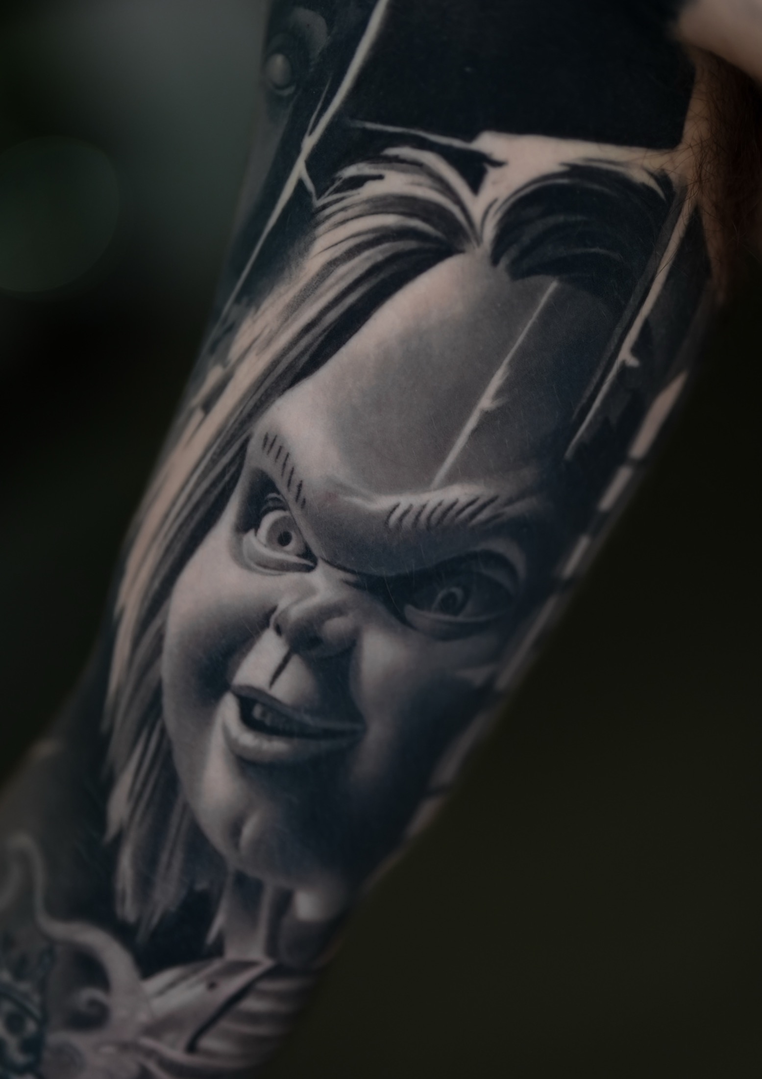 Finished dark realism doll tattoo.