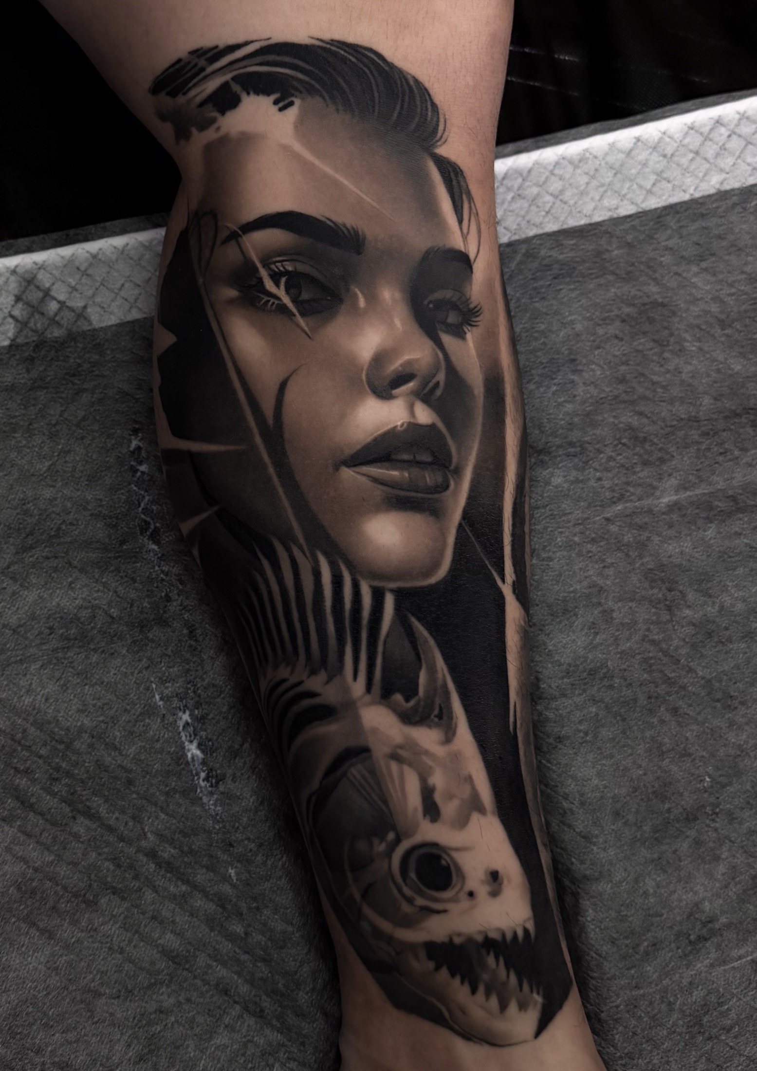 Finished dark realism fish portrait tattoo.