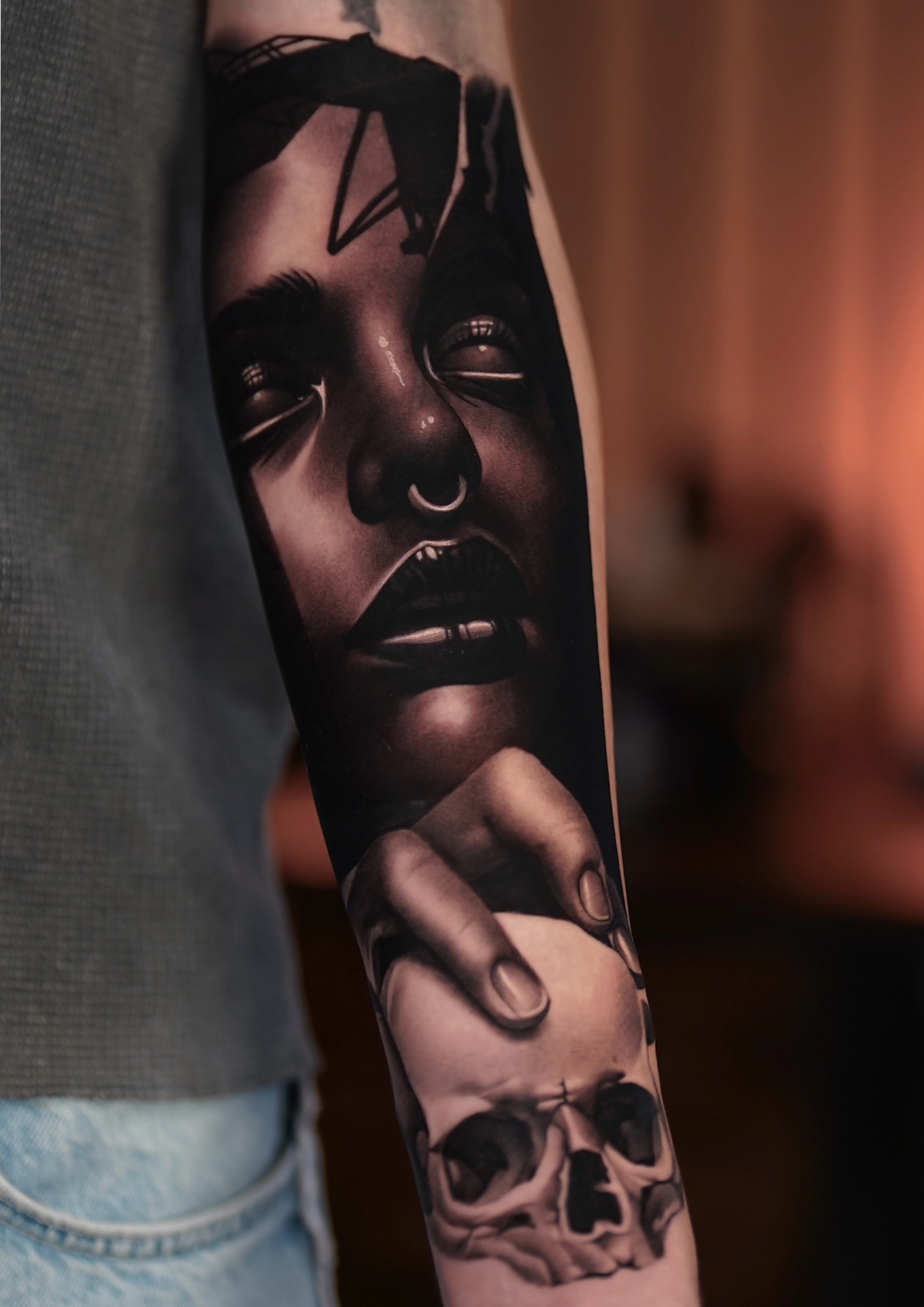 Finished dark realism skull portrait tattoo.
