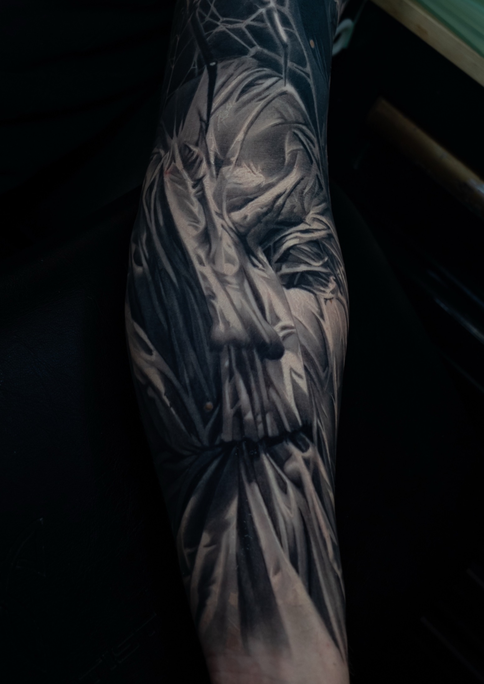 Finished dark realism veiled portrait tattoo.