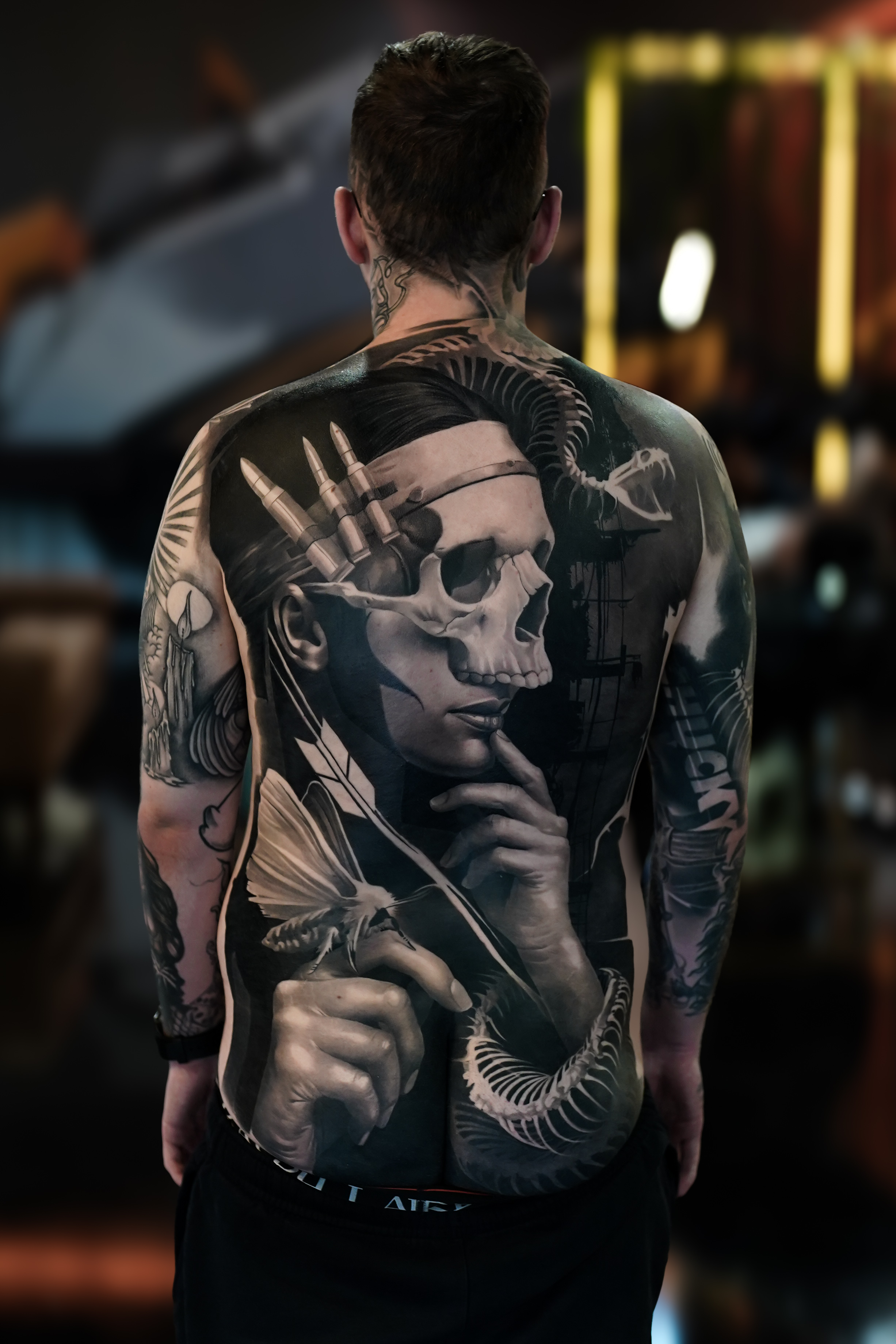 Large dark realism back tattoo