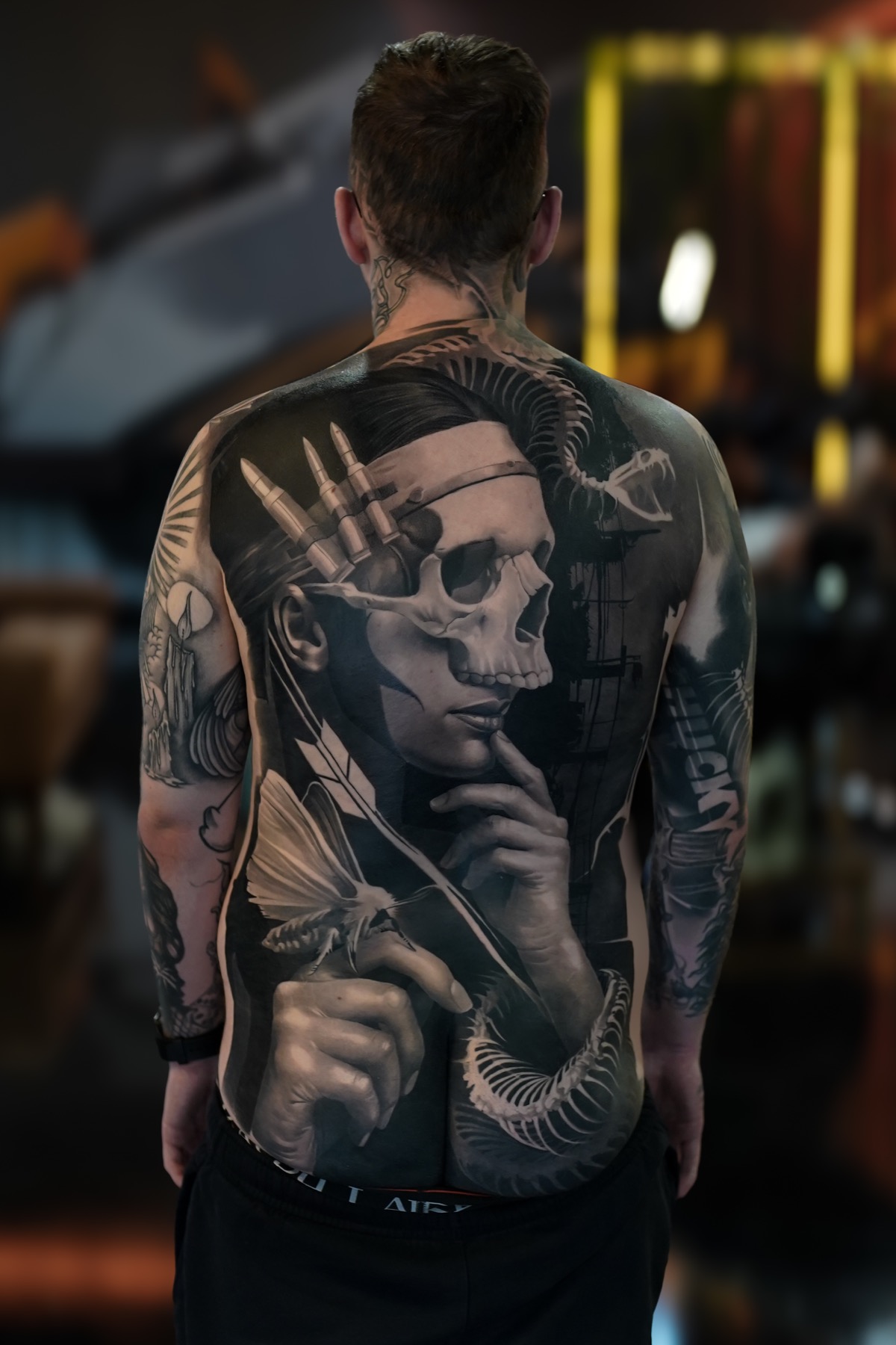 Dark realism full back tattoo by Fábio Guerreiro.