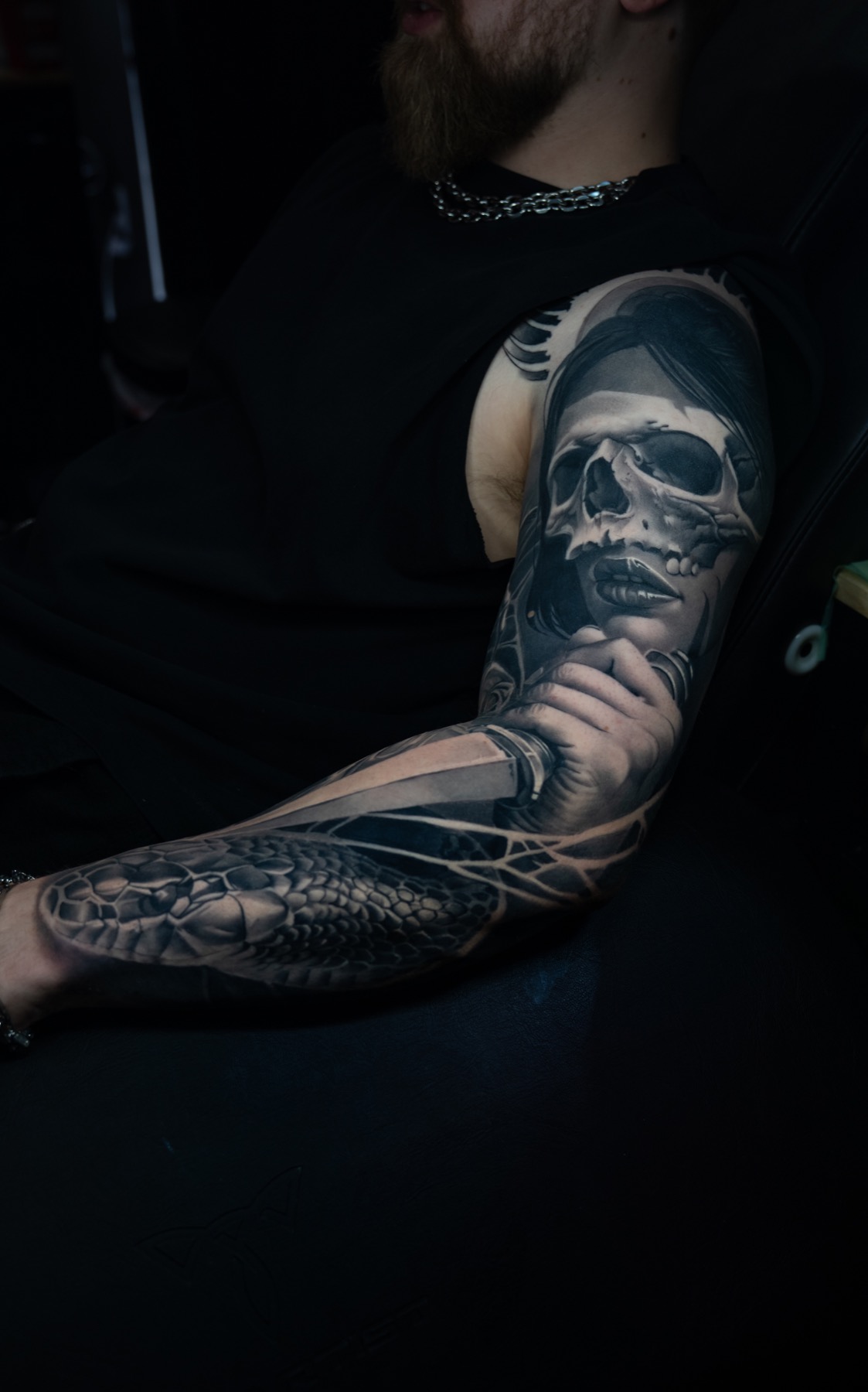 Finished dark realism sleeve tattoo by Fábio Guerreiro.