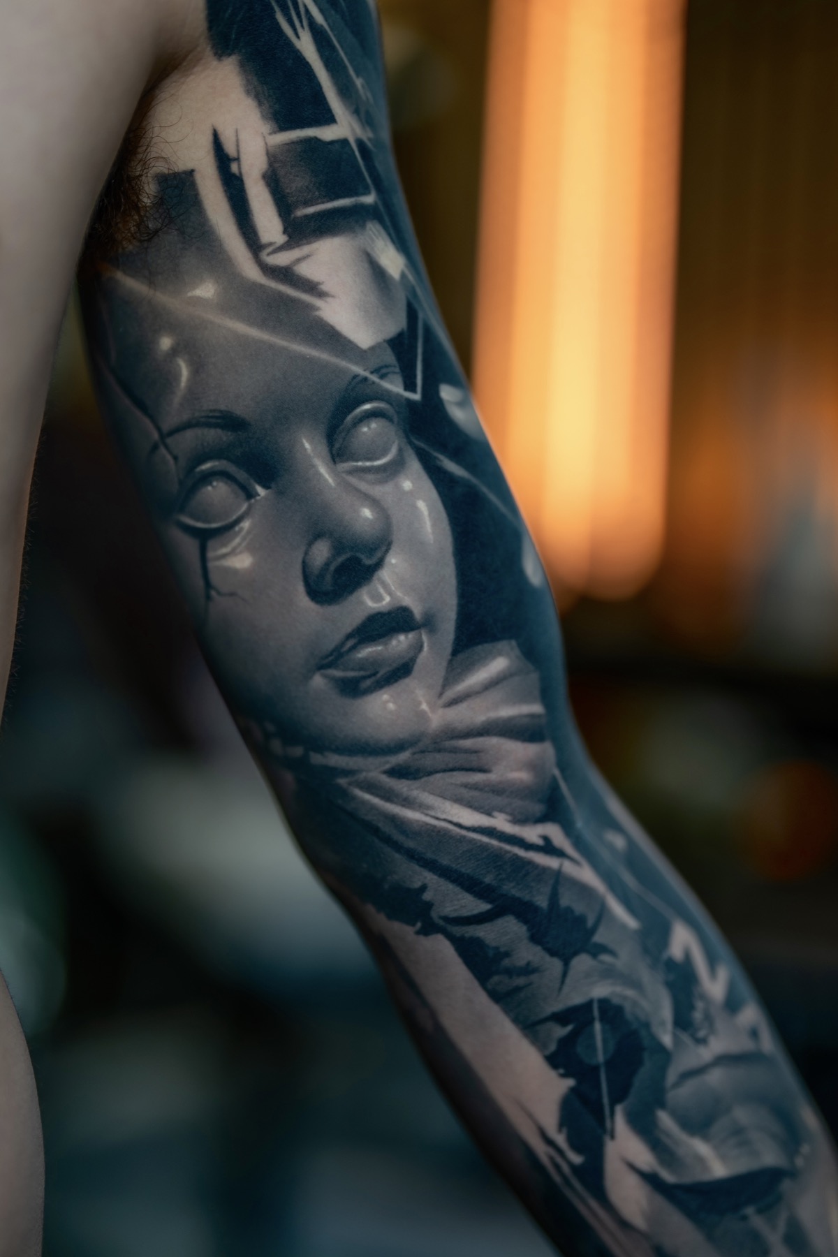 Healed black and grey tattoo detail by Fábio Guerreiro.