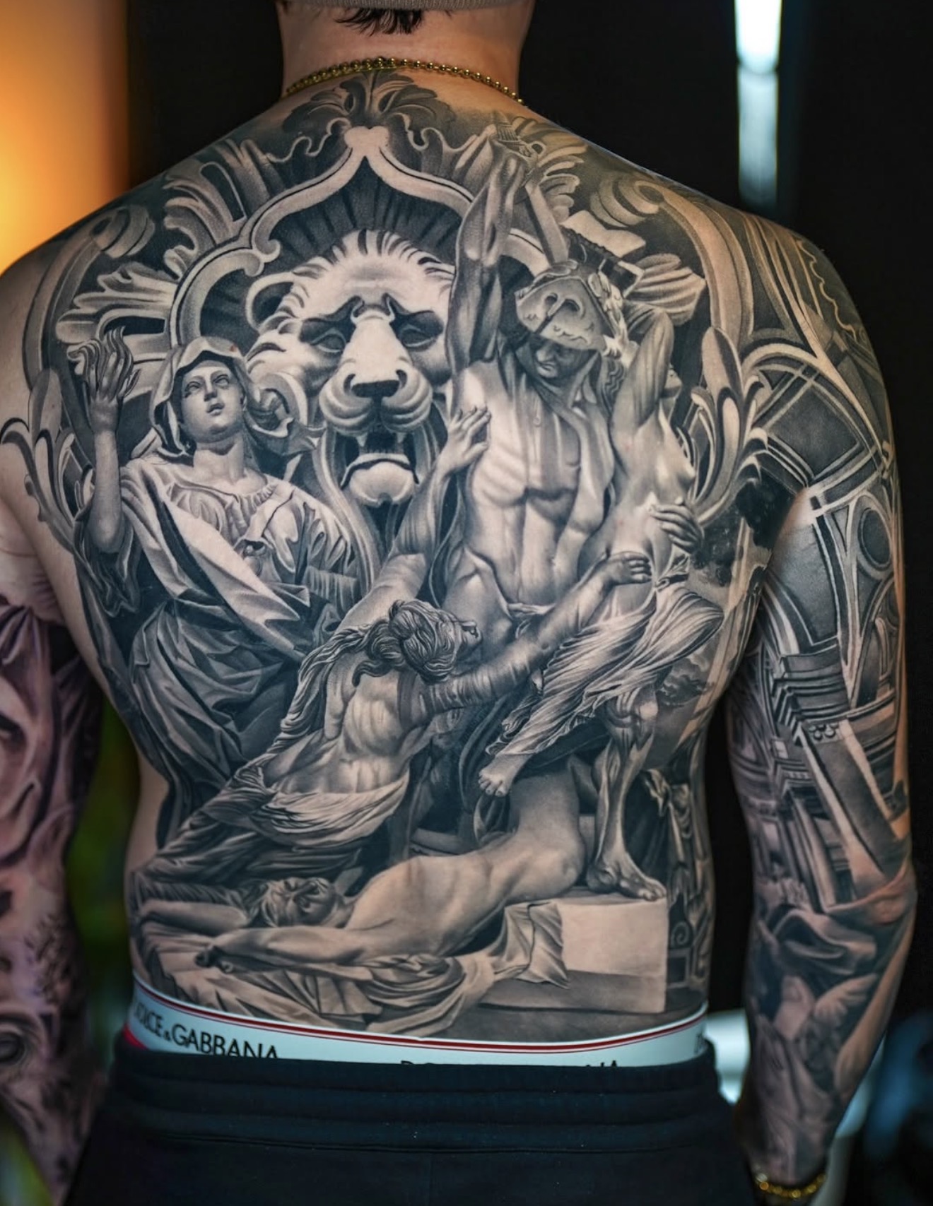 Large-scale black and grey back tattoo by Fábio Guerreiro.