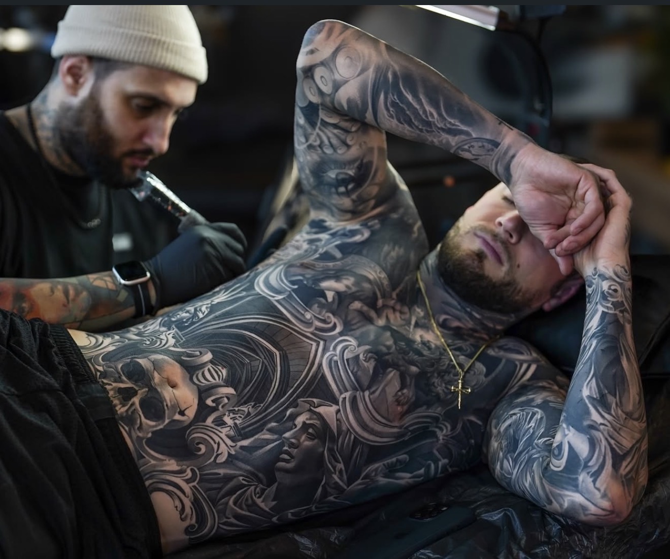 Large-scale black and grey torso tattoo by Fábio Guerreiro.