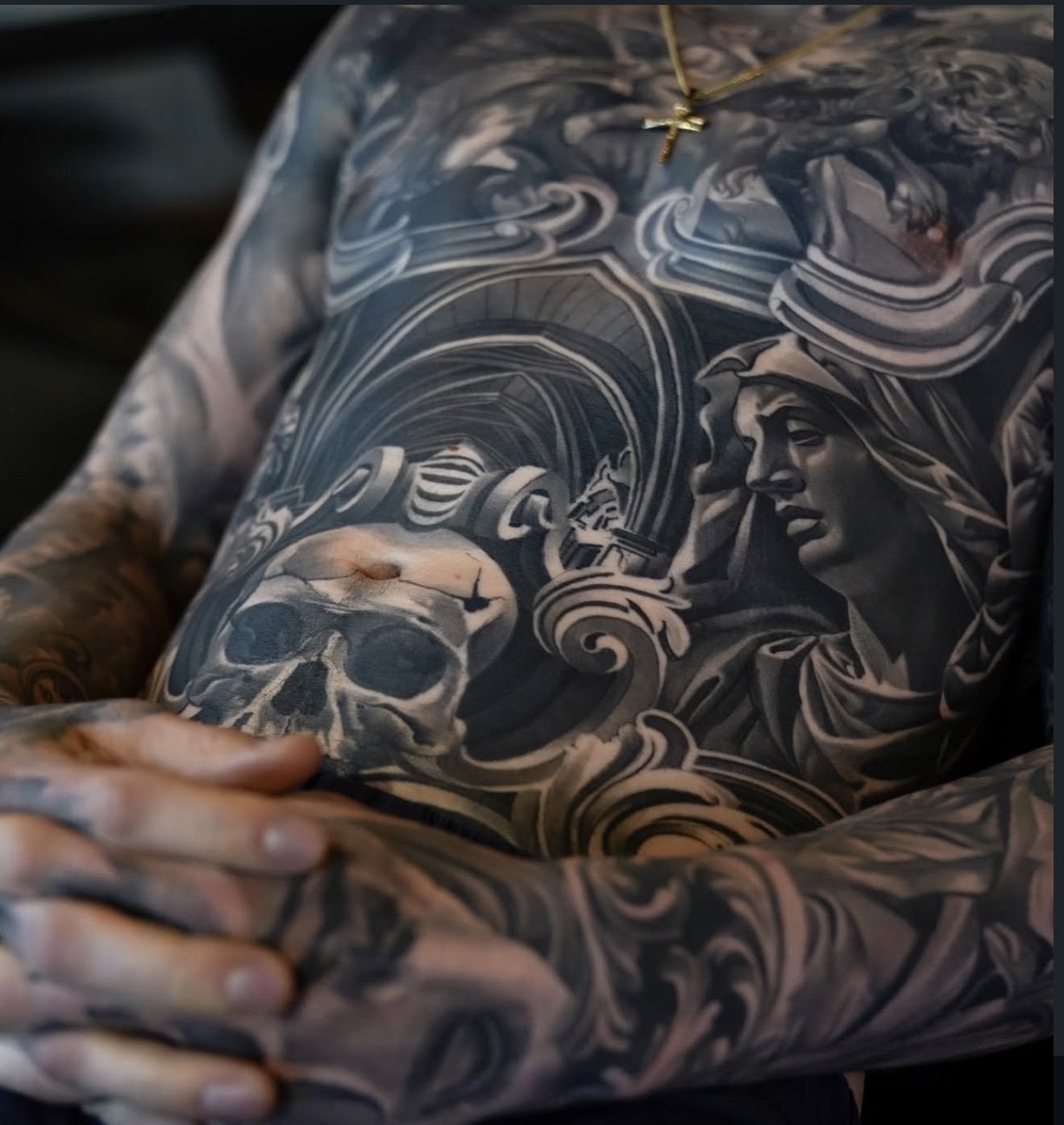 Black and grey torso tattoo detail by Fábio Guerreiro.