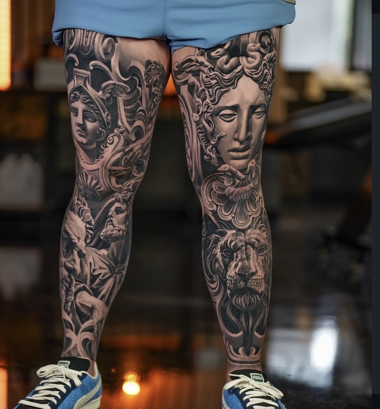 Black and grey double leg tattoo by Fábio Guerreiro.